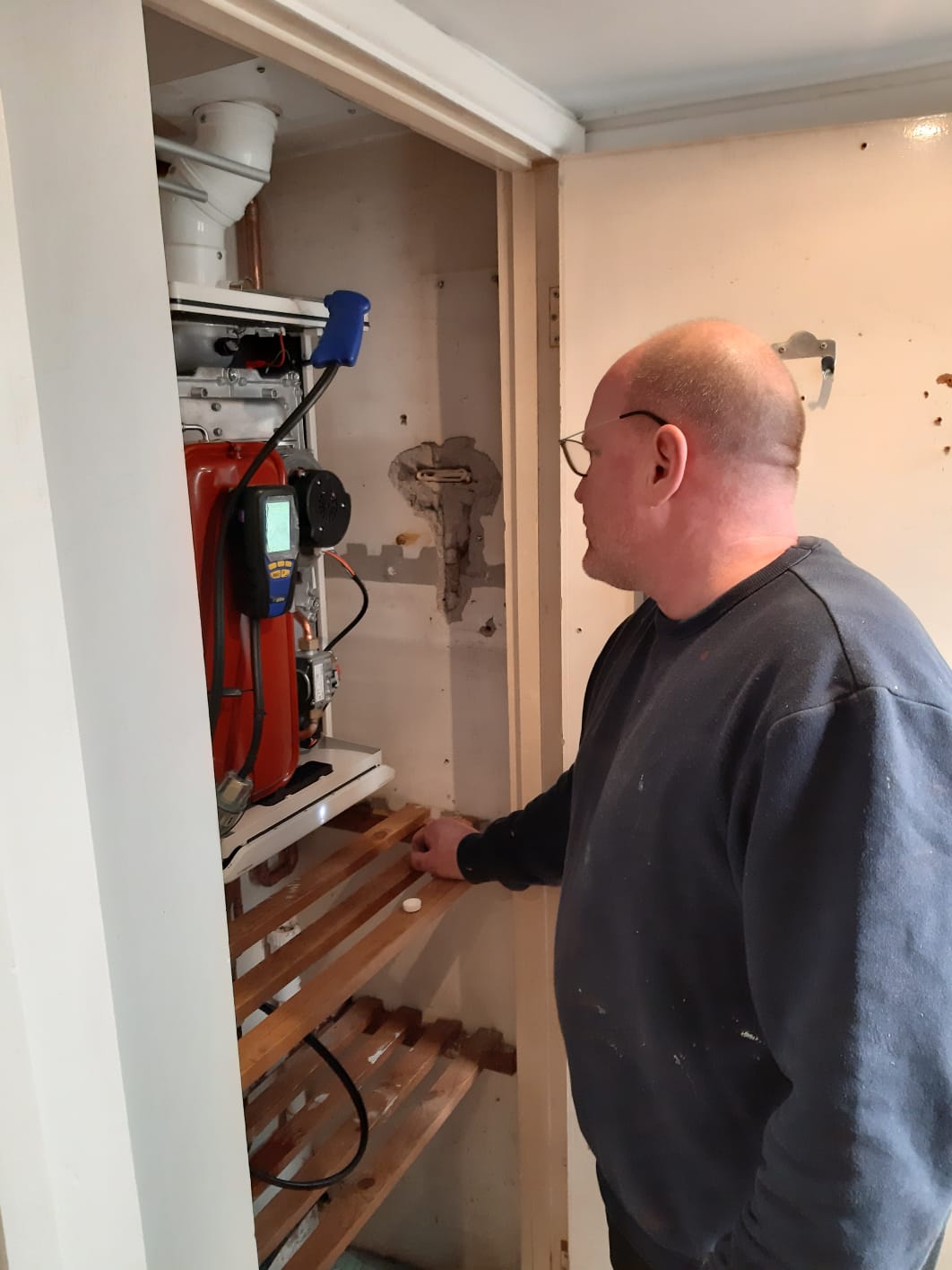 Pete carrying out boiler servicing work for Gas Mark